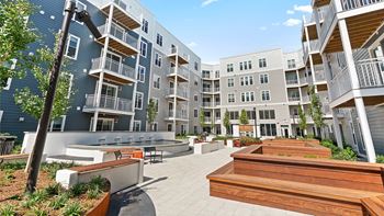 Outdoor kitchen with bbq grills & dining areas