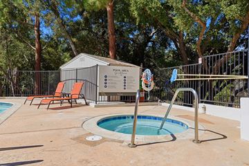 Westlake Village apartment for rent - A pool area with a pool, sun loungers and a pool house.
