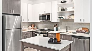 Gorgeous kitchens with two-toned custom cabinets and tiled backsplash