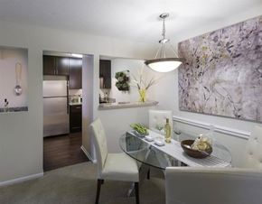 Germantown apartment for rent - A modern dining room with a glass table and chairs.