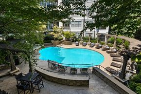 Atlanta apartment for rent - a large swimming pool in front of a hotel