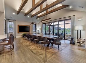 Exton apartment for rent - A modern dining room with a large wooden table and chairs.