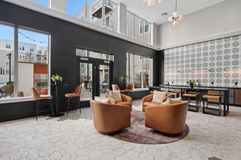 Lounge with high tops and connection to courtyard