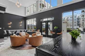 Lounge with high tops and connection to courtyard