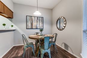 Austin apartment for rent - a dining area with a table and four chairs