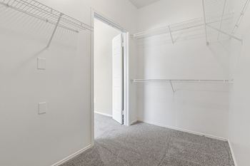 View into bedroom from walk-in closet