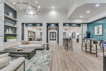 Austin apartment for rent - a living room and dining room with furniture and a chandelier