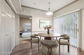 Austin apartment for rent - A dining room with a round table and chairs.