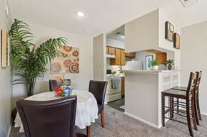 San Antonio apartment for rent - A dining room with a table and chairs.