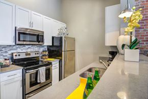 Atlanta apartment for rent - Pet-Friendly Apartments in Atlanta, GA - Biltmore at Midtown - Beautiful Kitchen with Stainless Steel Appliances
