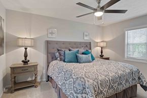 Atlanta apartment for rent - Glen Lake Apartments in Atlanta, GA 30328 photo of a bedroom with ceiling fan