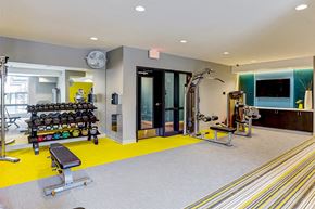 Minneapolis apartment for rent - a gym with weights and other equipment in a building