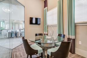 Woodstock apartment for rent - Pet-Friendly Apartments in Woodstock, GA – Lea Woodstock – clubhouse seating area with TV