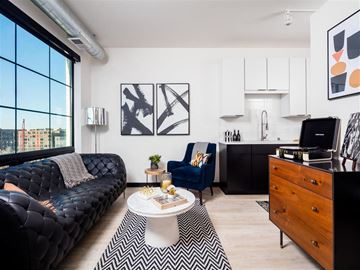 Minneapolis apartment for rent - a living room with a couch and a table