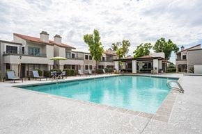 Scottsdale apartment for rent - Two Bedroom Apartments in Scottsdale, AZ - The Sycamore at Scottsdale - Pool with Gated Entry, Lounge Seating, Umbrellas, and Nice Landscaping