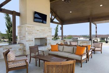 Poolside pavilion with natural gas lined grills