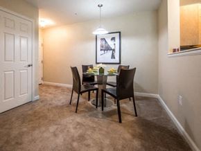 Littleton apartment for rent - a dining room with a table and chairs