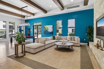 Santa Clara apartment for rent - A living room with a white couch and a wooden coffee table.