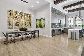 Santa Clara apartment for rent - A modern dining room with a long table and chairs.