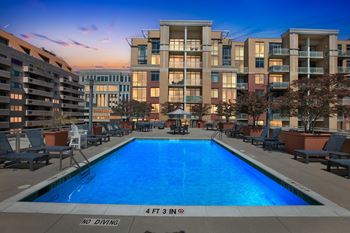 Sweeping rooftop pool and sundeck with skyline views