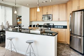 Arlington apartment for rent - A kitchen with a white counter and a refrigerator.