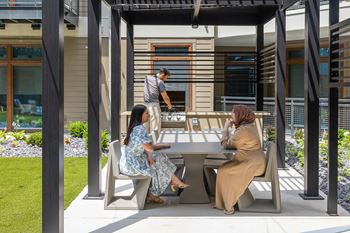 Grilling stations, including a flattop grill and fire pit