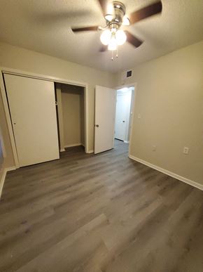 Kansas City apartment for rent - the view from the top of the stairs looking down into the closet