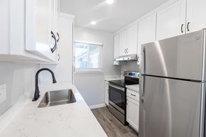 Mountain View apartment for rent - A modern kitchen with a stainless steel refrigerator.