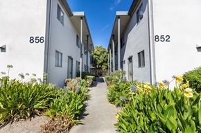 San Mateo apartment for rent - A white building with the numbers 856 and 852 on it.