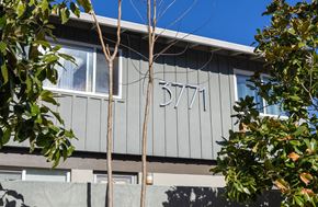 Santa Clara apartment for rent - A grey building with the number 3771 on it.