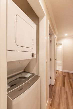 Santa Clara apartment for rent - A white dishwasher is built into a kitchen cabinet.
