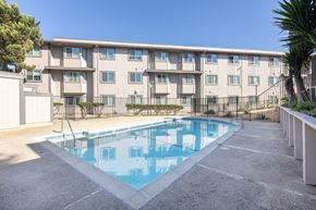 Salinas apartment for rent - A swimming pool in front of a building.