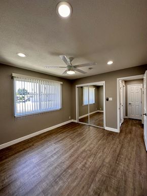 San Jose apartment for rent - an empty living room with a ceiling fan