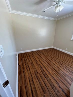 Menlo Park apartment for rent - a room with a wooden floor and a ceiling fan