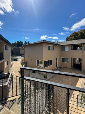 Mountain View apartment for rent - a view of a building from a balcony with a blue sky