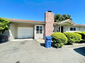 Castro Valley apartment for rent - A house with a blue trash bin in front of it.