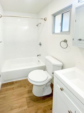 Redwood City apartment for rent - a bathroom with a toilet and a tub and a sink
