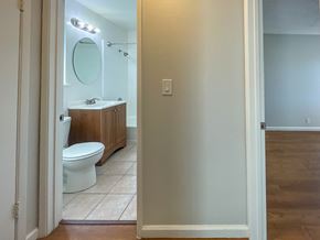 Santa Clara apartment for rent - a bathroom with a toilet and a sink and a mirror