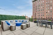 Washington apartment for rent - Rooftop deck with lounge area at 1633 Q, Washington, 20009