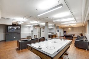 Alexandria apartment for rent - Game room with air hockey at Mason Hall in Alexandria, VA 22314