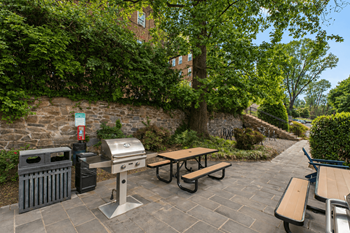 Park crest apartments terrace with grills and picnic tables