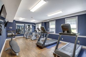 A fitness center with treadmills at park crest apartments, district of columbia 20007