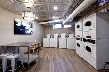 Laundry room with seating area