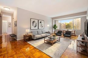 Washington apartment for rent - A living room with a grey sofa, a grey couch, a grey chair, a grey rug, a grey coffee table, a grey floor lamp, a grey wall, a grey door, a grey wall, a grey wall, a grey