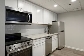 Arlington apartment for rent - Renovated kitchen with granite countertops and stainless steel appliances  at Lenox Club, National Landing, Arlington, VA 22202