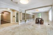 Alexandria apartment for rent - Lobby with post boxes and seating area at Mason Hall in Alexandria, VA 22314