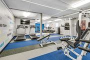 Alexandria apartment for rent - Fitness center with treadmills, machines and free weights at Mason Hall in Alexandria, VA 22314