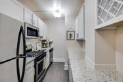 Washington apartment for rent - Renovated kitchen with granite countertops and stainless steel appliances at Cathedral Mansions, Washington, DC, 20008