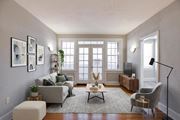 Washington apartment for rent - Living room with sunroom at The Paramount Apartments in the Petworth neighborhood in Washington, DC 20011