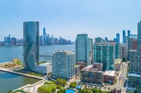 Jersey City apartment for rent - Aerial view of Newport buildings with Manhattan Skyline